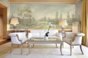 Living room with large scenic mural wallpaper