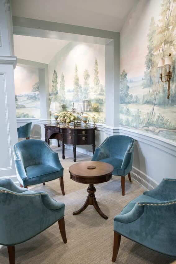 Sitting area with scenic mural wallpaper