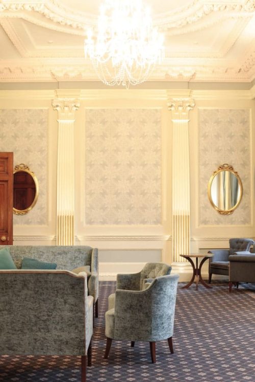 Patterned wallpaper panels in Hedsor House living room